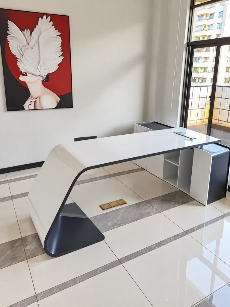 L-Shaped Executive Office Desk in white with dark curved leg